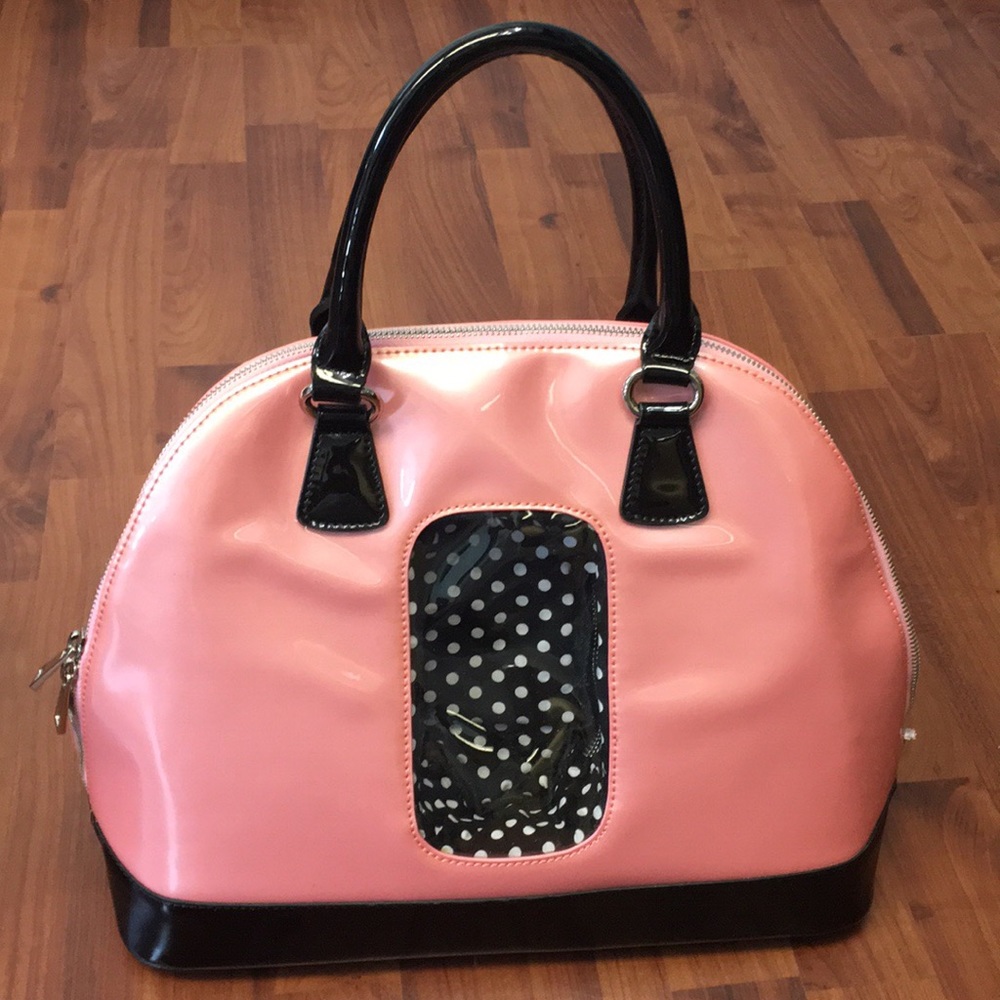 Pink patent leather handbag w display window